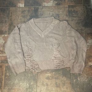 Ripped sweater